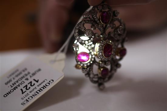 An attractive early 20th century gold and platinum, ruby and diamond pendant brooch, overall 2.5in.